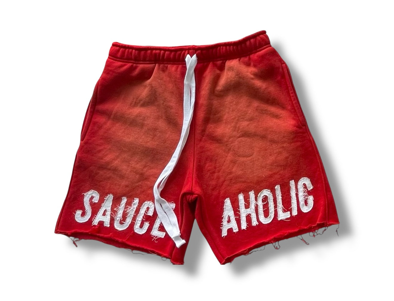 Distressed drip shorts red
